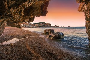 picturesque summer landscape pebble Przno beach near Budva and Sveti Stefan beach e1638795515304